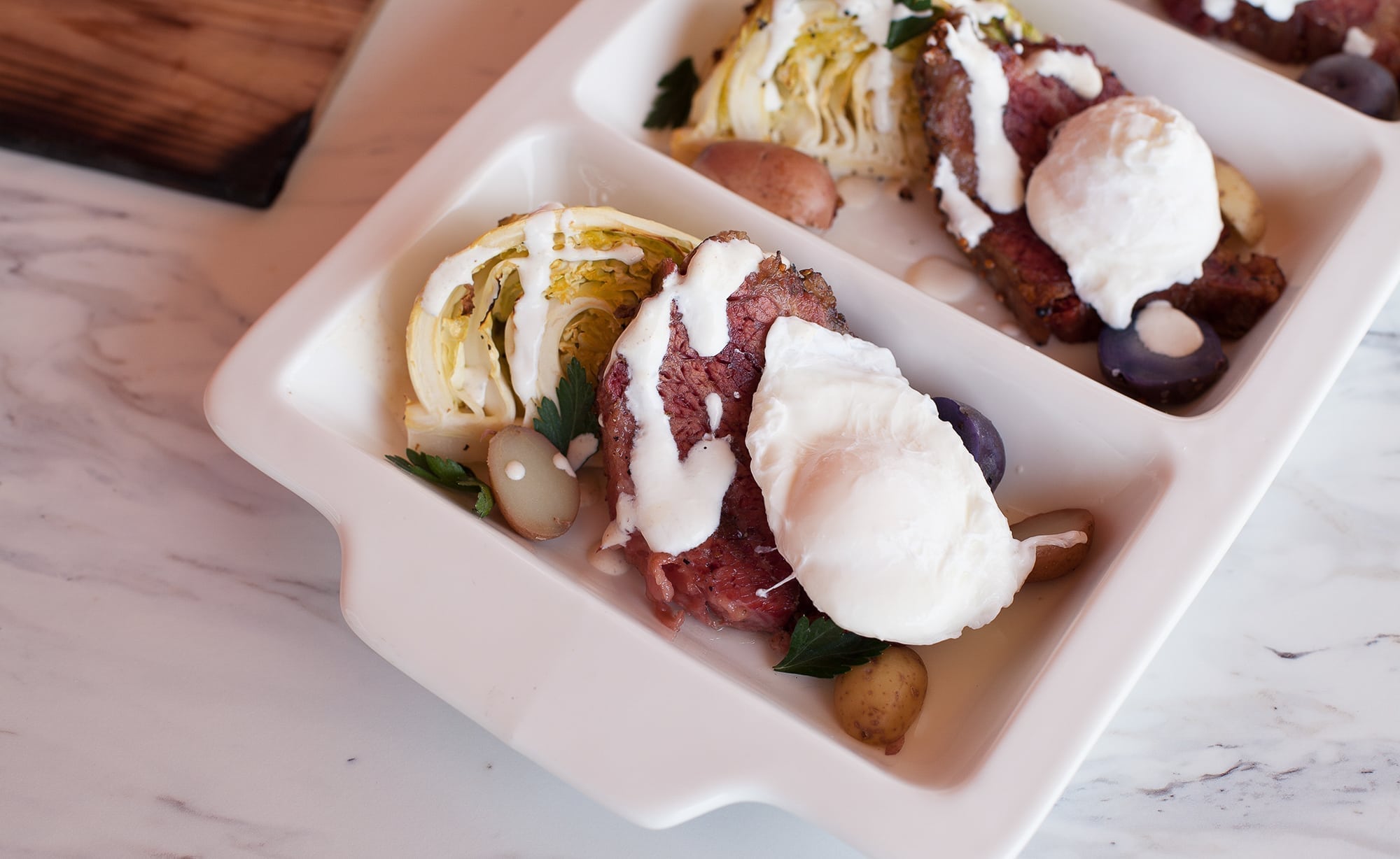 Alder Planked Cabbage Wedges with Corned Beef and Poached Eggs