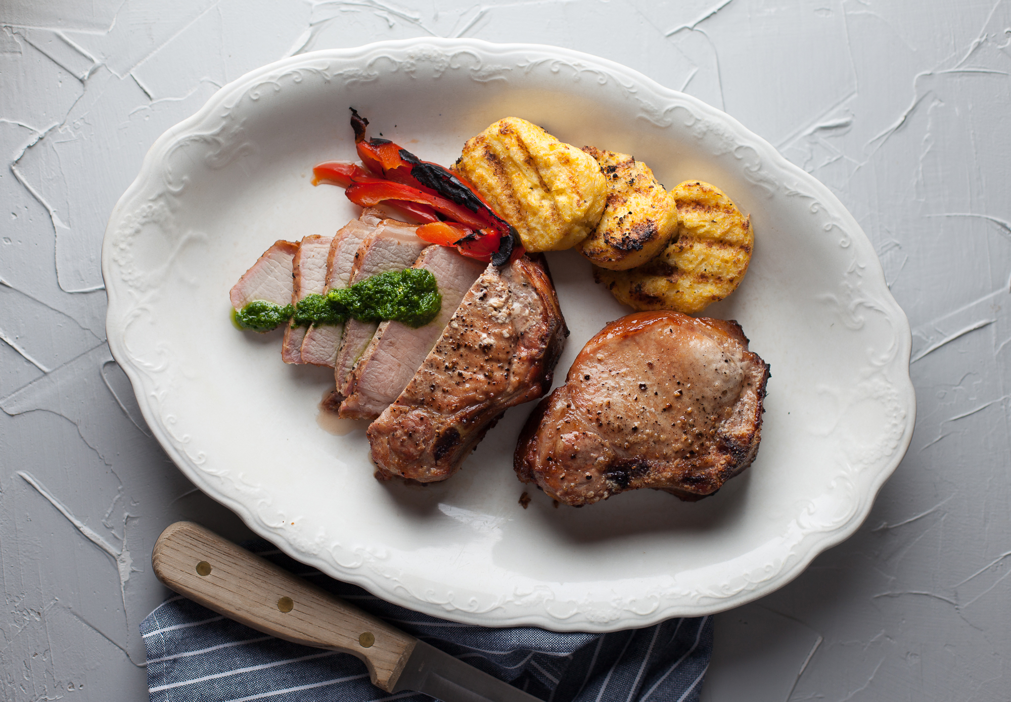 Grilling Dinner Idea: Oak Smoked Pork Chops with Arugula Pesto