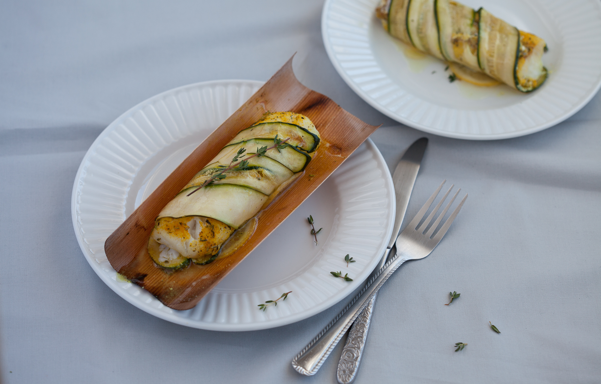 Cedar and Zucchini Wrapped Cod Loin with Turmeric and Lemon
